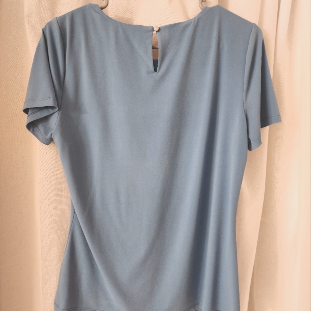 Calvin Klein size Medium light blue top